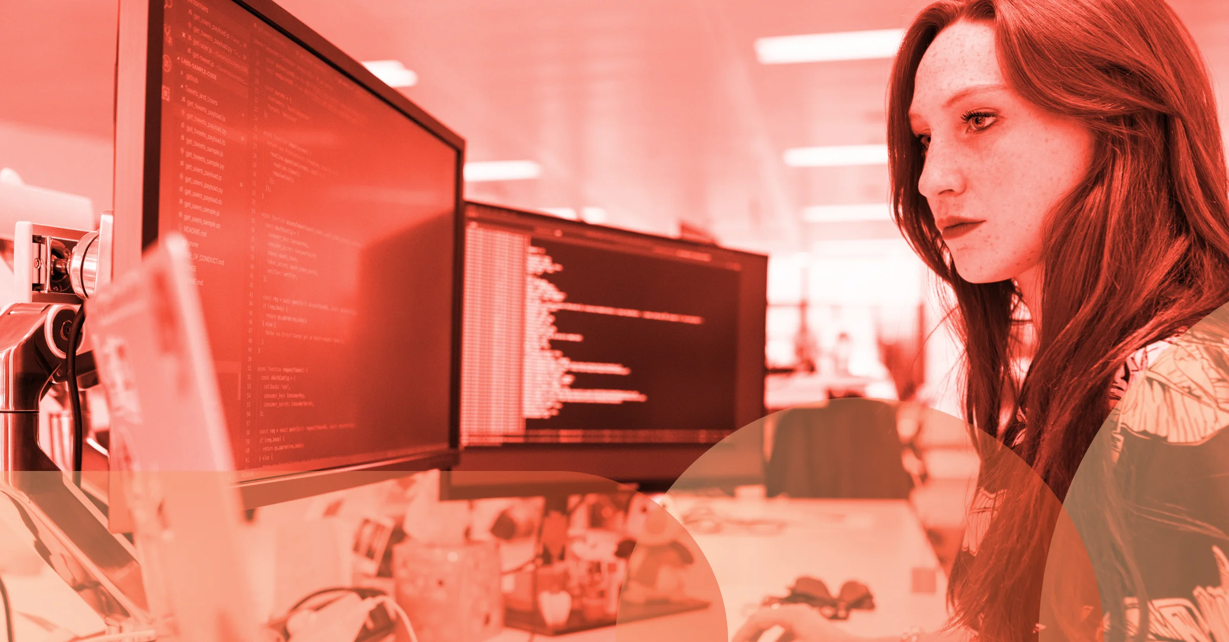 The Six-Stage Lifecycle of Workload Secrets and How it Impacts Identity and Access Management header image with person working at computer